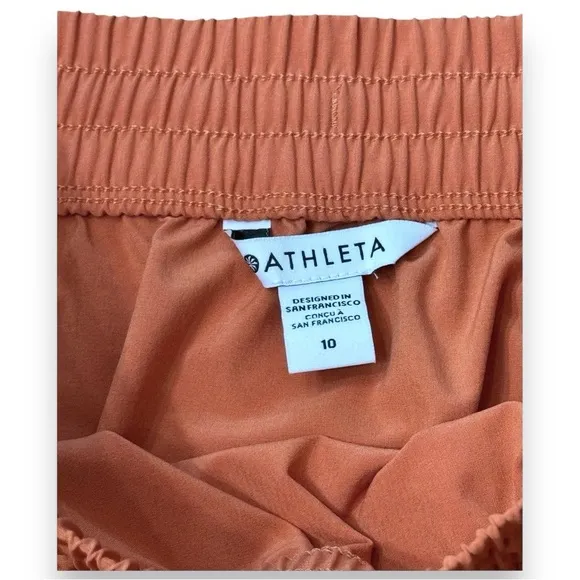 Athleta Arrival Pull-on Skirt Sunbaked Clay Red Orange Zip Pocket Women’s Sz 10