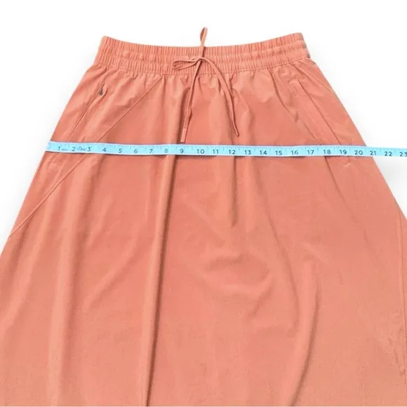 Athleta Arrival Pull-on Skirt Sunbaked Clay Red Orange Zip Pocket Women’s Sz 10