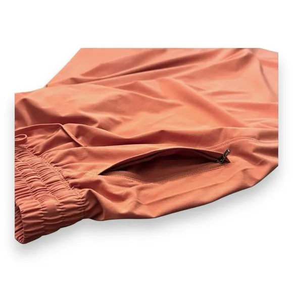 Athleta Arrival Pull-on Skirt Sunbaked Clay Red Orange Zip Pocket Women’s Sz 10
