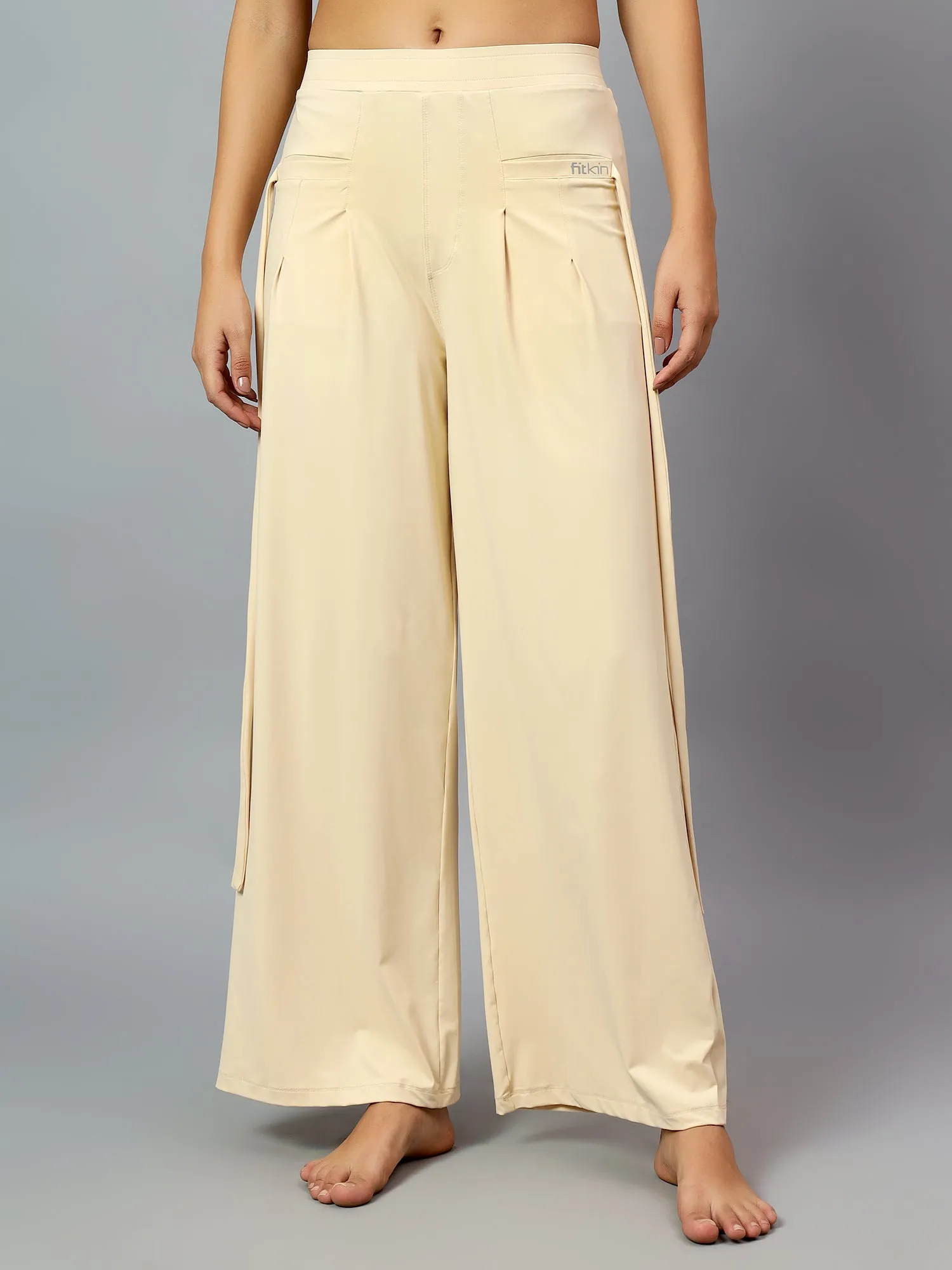 Fitkin Women's Cream Relaxed Fit Pleated Bootcut Trackpant