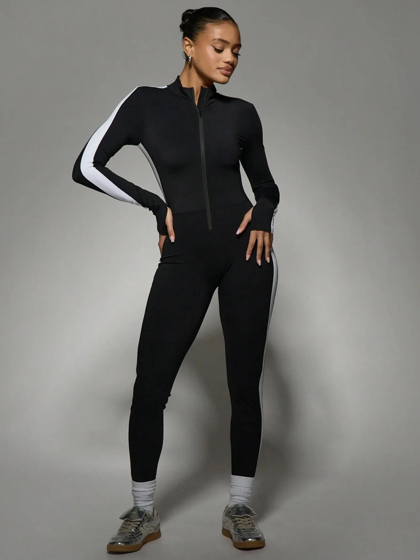 Sleek Long-Sleeve High-Neck Zip Jumpsuit – Sporty & Chic Style
